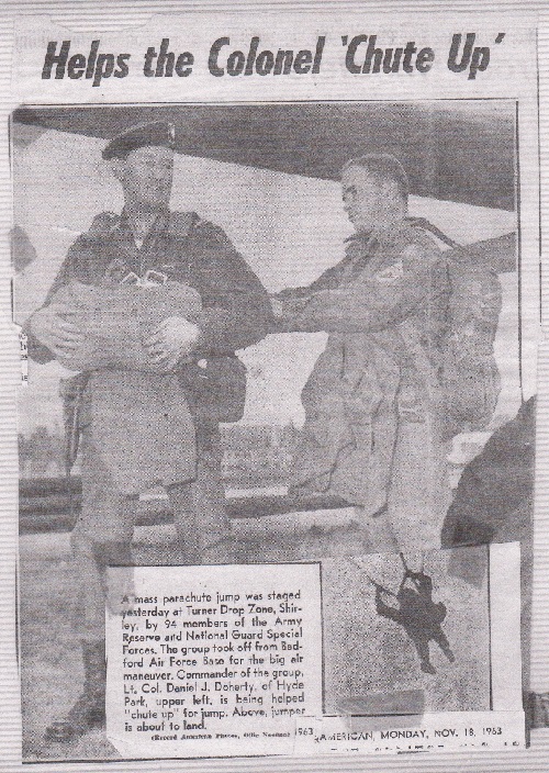 1963 - LTC Dan Doherty rigs up for parachute jump